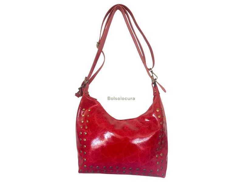 Bolso y Bandolera de Piel satinada con tachas. De color rojoazul